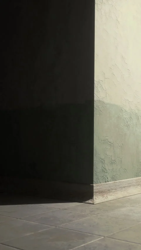 Light and shadow interact at a corner in a simple room interior Stock Footage 336430527