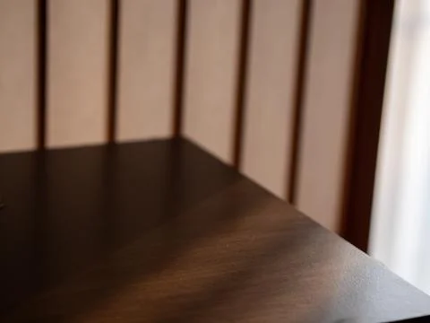 Light and shadows being cast through a paper door Stock-Fotos