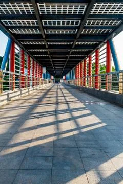 Light and shadows of a bridge at sunset Stock Photos