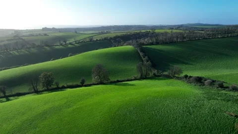 Light and Shadows over Fields and Farms from a drone, Torquay, Devon, UK Stock Footage 222588070