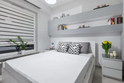 Light and spacious bedroom Stock Photos