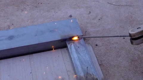 The light and spark generated by electric welding of steel Stock Footage 168280256