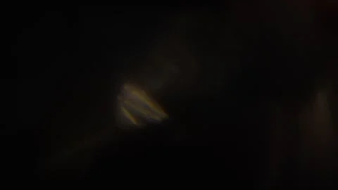 Light animation with bright rays superimposed on blurred light creates a Stock Footage 242008557