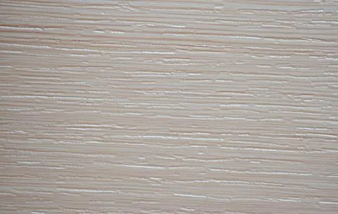 Light apple tree, texture and natural pattern of natural wood on the cut. Stock Photos