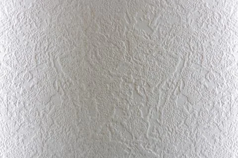 Light background. Abstract texture of vinyl wallpaper on the wall. Stock Photos