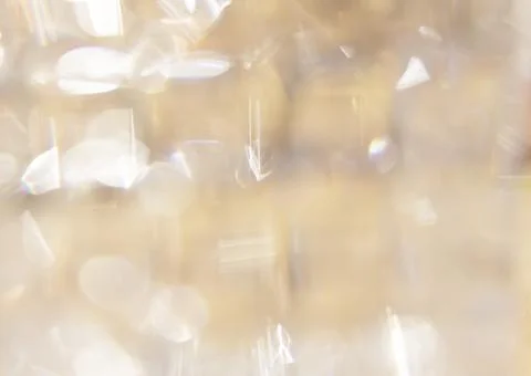 Light background with blurred sparkles in a soft style. no focus Stock Photos