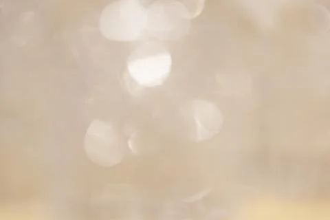 Light background with blurred sparkles in a soft style. no focus Stock Photos
