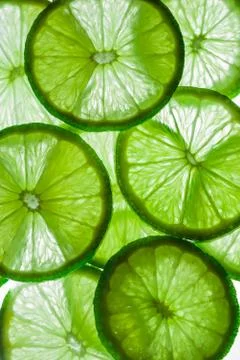 Light background with citrus fruit of lime slices, background Stock Photos