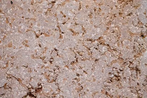 Light background from natural limestone. Texture of natural stone with cracks Foto stock
