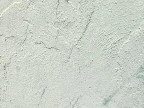 Light background with rustic cement-like wall texture. Stock Photos