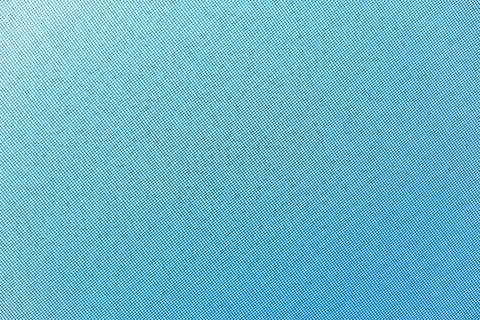Light background: sky blue light visible through a mosquito net Stock Photos
