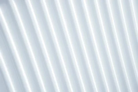 Light background with straight lines. Lines on blurred abstract background wi Stock Photos