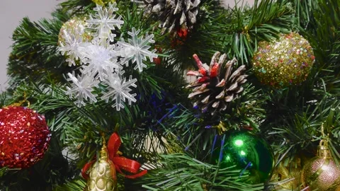 On a light background video postcard Christmas toys on a green tree and gifts Stock Footage 159159845