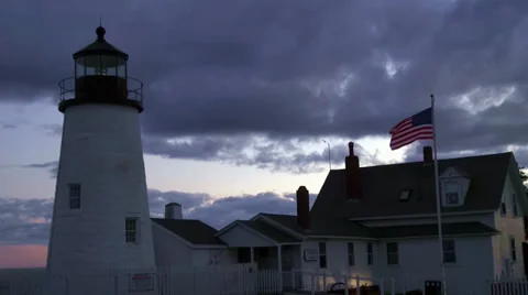 Light beacon of a lighthouse at dusk Stock Footage 34135678