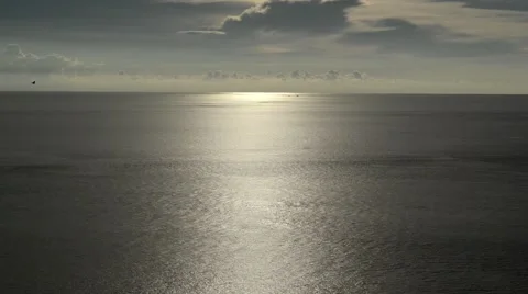 Light beam shining through the cloudscape over the sea Video stock 45029375