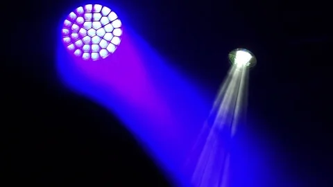 Light beams coming from LED illuminators on a stage of a concert Stock Footage 71812913