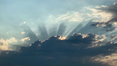Light beams emerging from the clouds in the sky Stock Footage 171962192