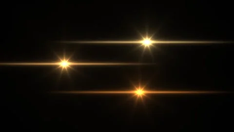 Light beams shine through dark background with bright spots Stock Footage 338226112