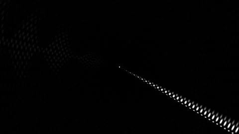 Light beams shine through a dark tunnel creating a pattern Stock Footage 339341640