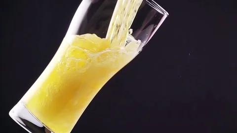 Light Beer is Poured into the Glass Видео 73040102