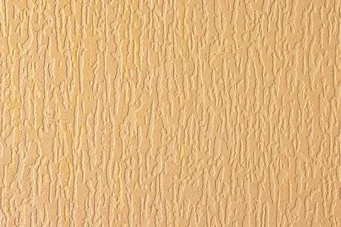 Light beige embossed texture closeup wavy surface Stock Photos