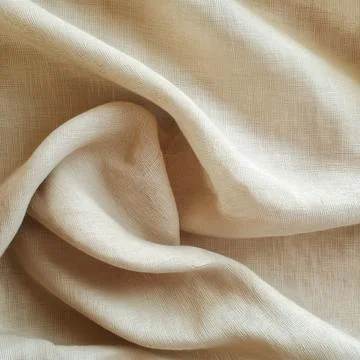 Light beige fabric texture with soft natural folds Stock Photos