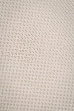 Light beige knitted fabric texture pattern Stock Photos