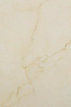 Light beige marble surface with subtle patterns and variations in texture and Foto stock