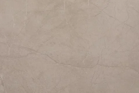 Light beige marble surface with subtle textures and patterns ideal for interior Foto stock