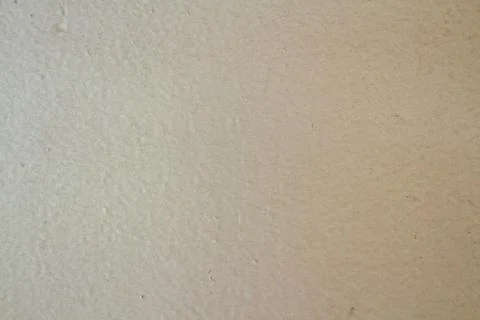 Light beige paper texture with subtle grain and natural imperfections 库存照片
