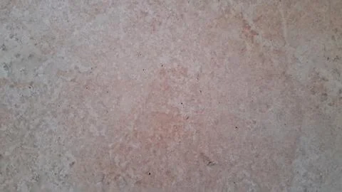 Light beige stone texture with natural mottled patterns and grit Stock Photos