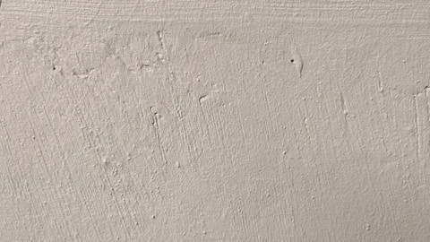 Light Beige Textured Wall Surface Background Fotos de archivo