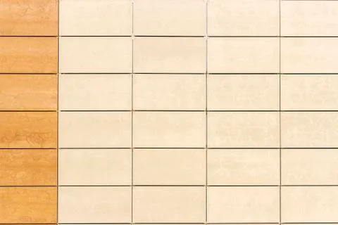 Light beige tile wall texture background 写真素材
