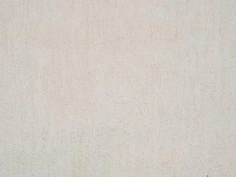 Light beige wall with decorative textured plaster. Not seamless texture Stock Photos