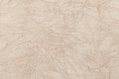Light beige wavy background from a textile material. Fabric with natural text Stock Photos