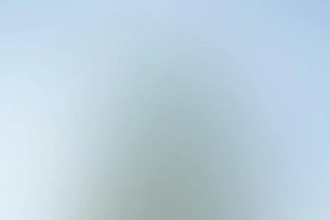 Light blue and gray gradient blurry abstract background. Smooth colors blen.. Stock Illustration