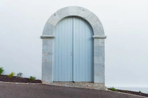 Light blue arched door 写真素材
