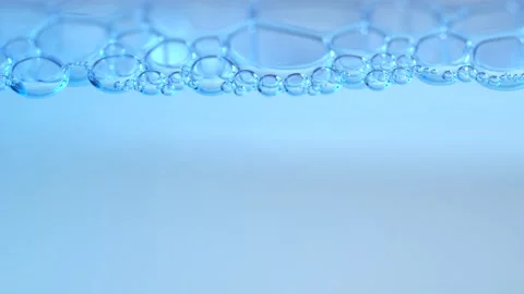 Light blue background with bubbles. Refreshing, cosmetics background. Stock Footage 275889048
