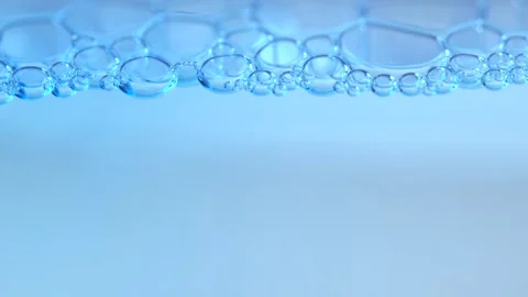 Light blue background with bubbles. Refreshing, cosmetics background. Stock Footage 281269865