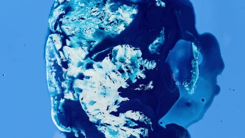Light blue background with dark ink spreading to degrade white patches Video stock 269028543