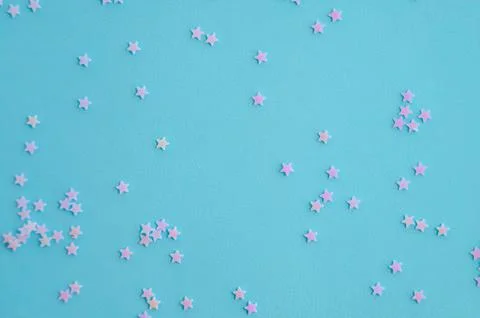Light blue background with delicate holographic glitter Stock Photos