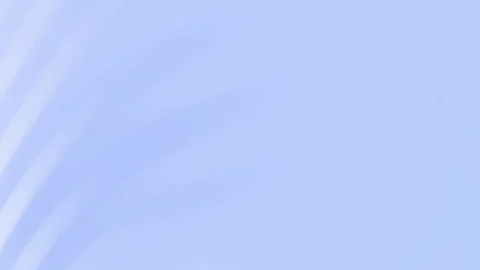 Light blue background features subtle white light streaks. Stock Footage 293107629