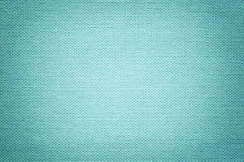 Light blue background from a textile material. Fabric with natural texture. B Stock Photos