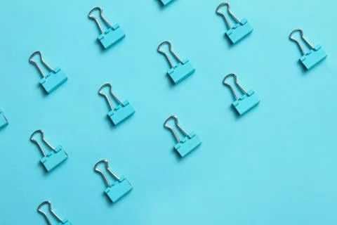 Light blue binder clips Stock Photos