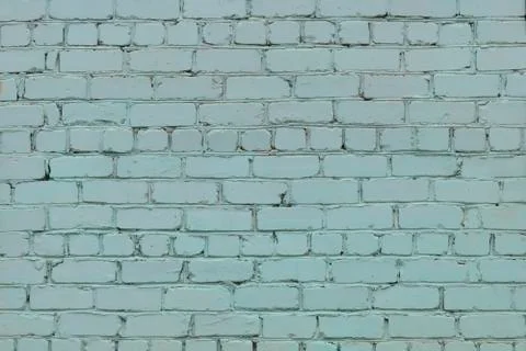 Light blue brick wall background in rural area Stock Photos