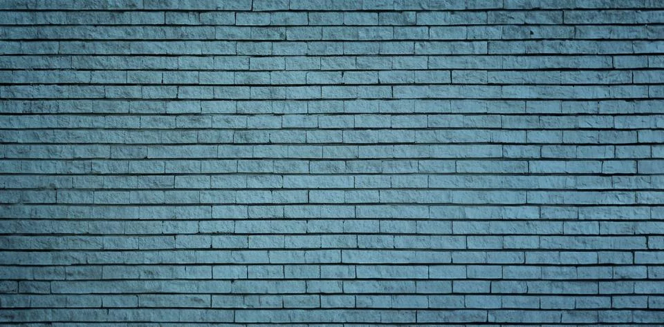 Light blue brick wall as background, banner design Foto stock