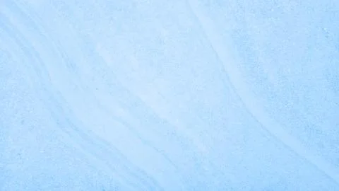 Light blue cement texture background with subtle variations and soft finish.. Stock Photos