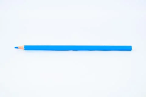 Light blue colored sharp wood pencil crayon isolated on a white background Stock Photos