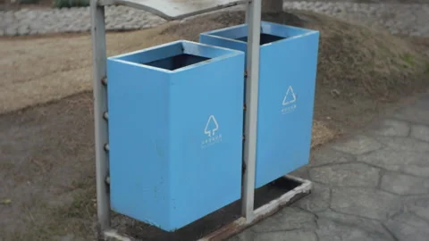 Light blue communal garbage bin in a park in Shanghai Stock-Footage 166361398