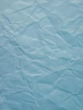 Light blue crumpled paper texture background with heavy creases and abstrac.. Stock Photos